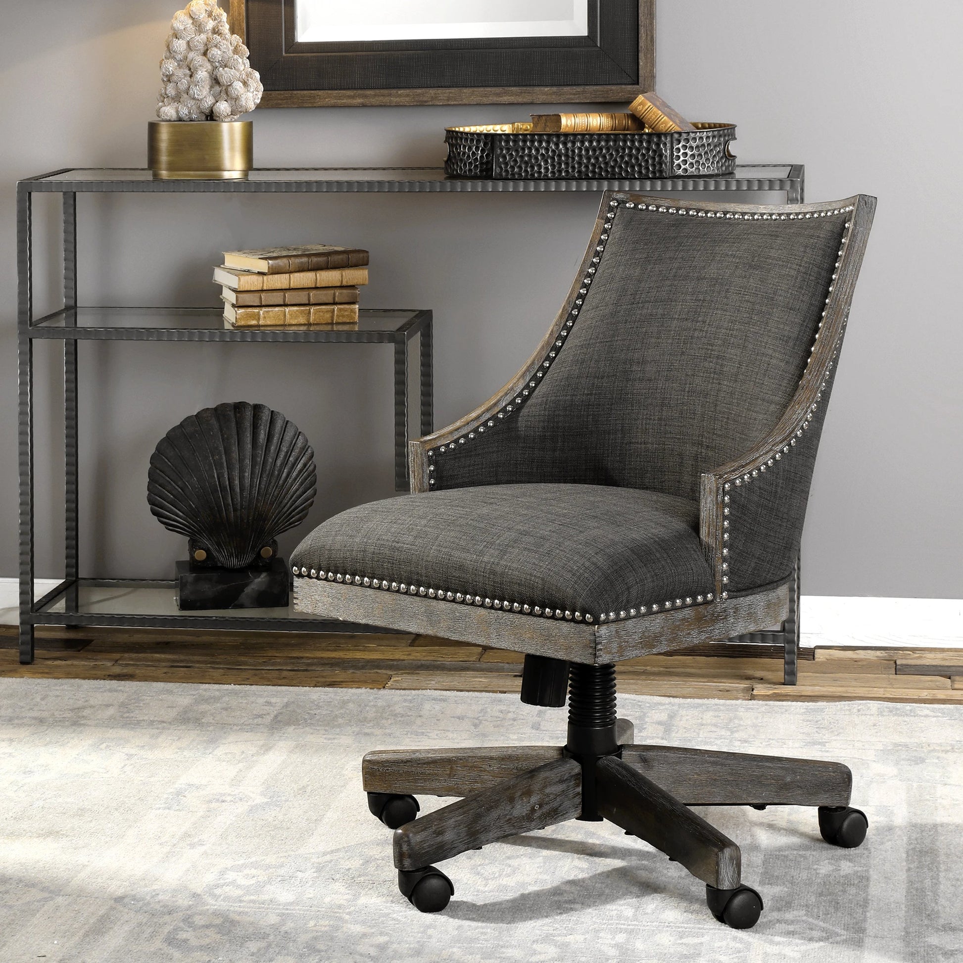 Aidrian Charcoal Desk Chair by Uttermost in charcoal. Made from metal, bent wood, plywood, fabric, foam in a cottage & farmhouse style.