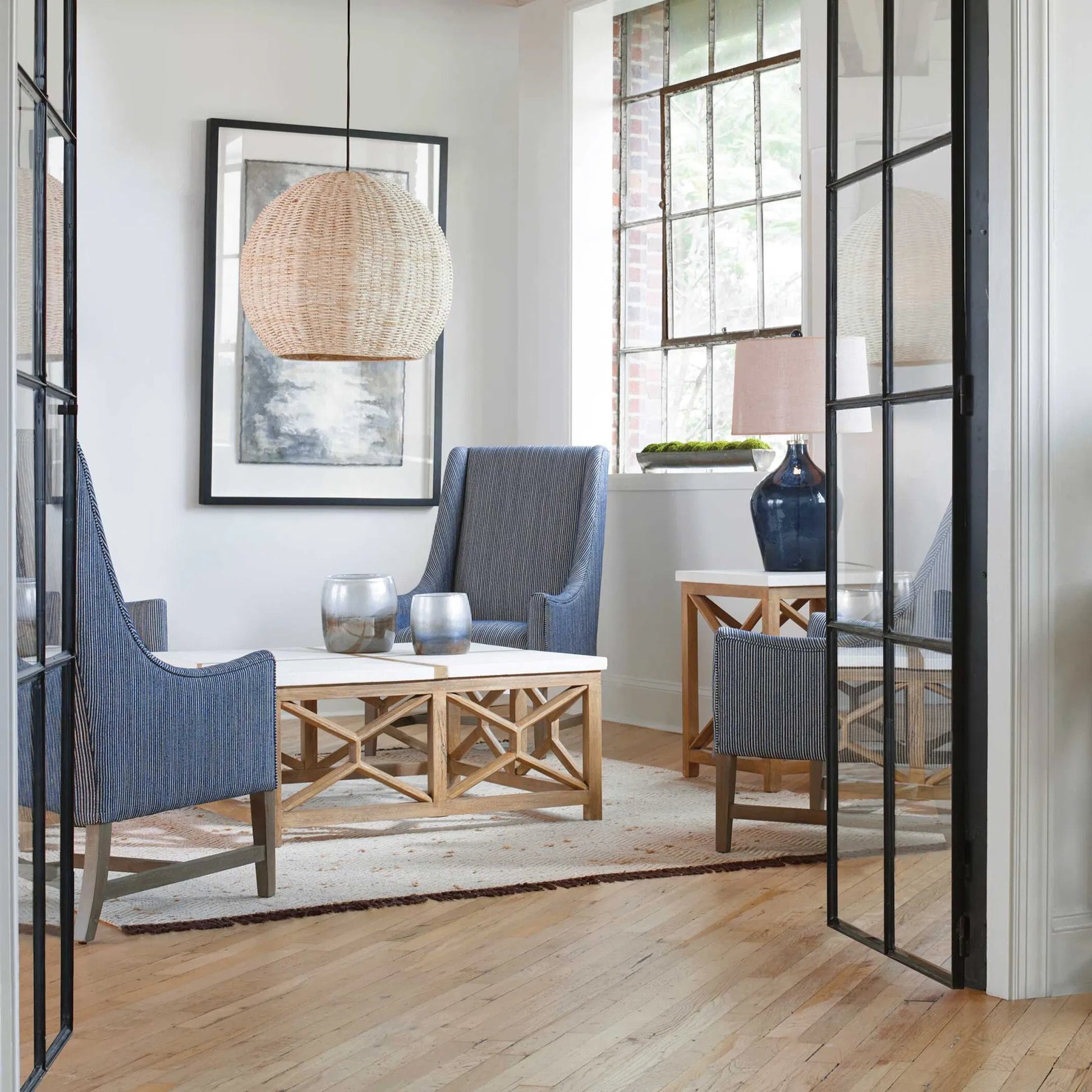 Catali Stone Coffee Table by Uttermost. Made from javawood with plywood carb phase 2, limestone in a transitional style.