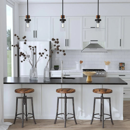 Westlyn Industrial Bar Stool by Uttermost. Made from iron metal with suar wood in a modern style.