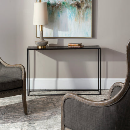 Coreene Console Table by Uttermost in aged black, antique bronze. Made from aluminum, iron in a modern style.