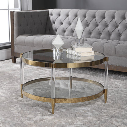 Kellen Coffee Table by Uttermost in gold. Made from stainless steel, glass, acrylic in a transitional style.