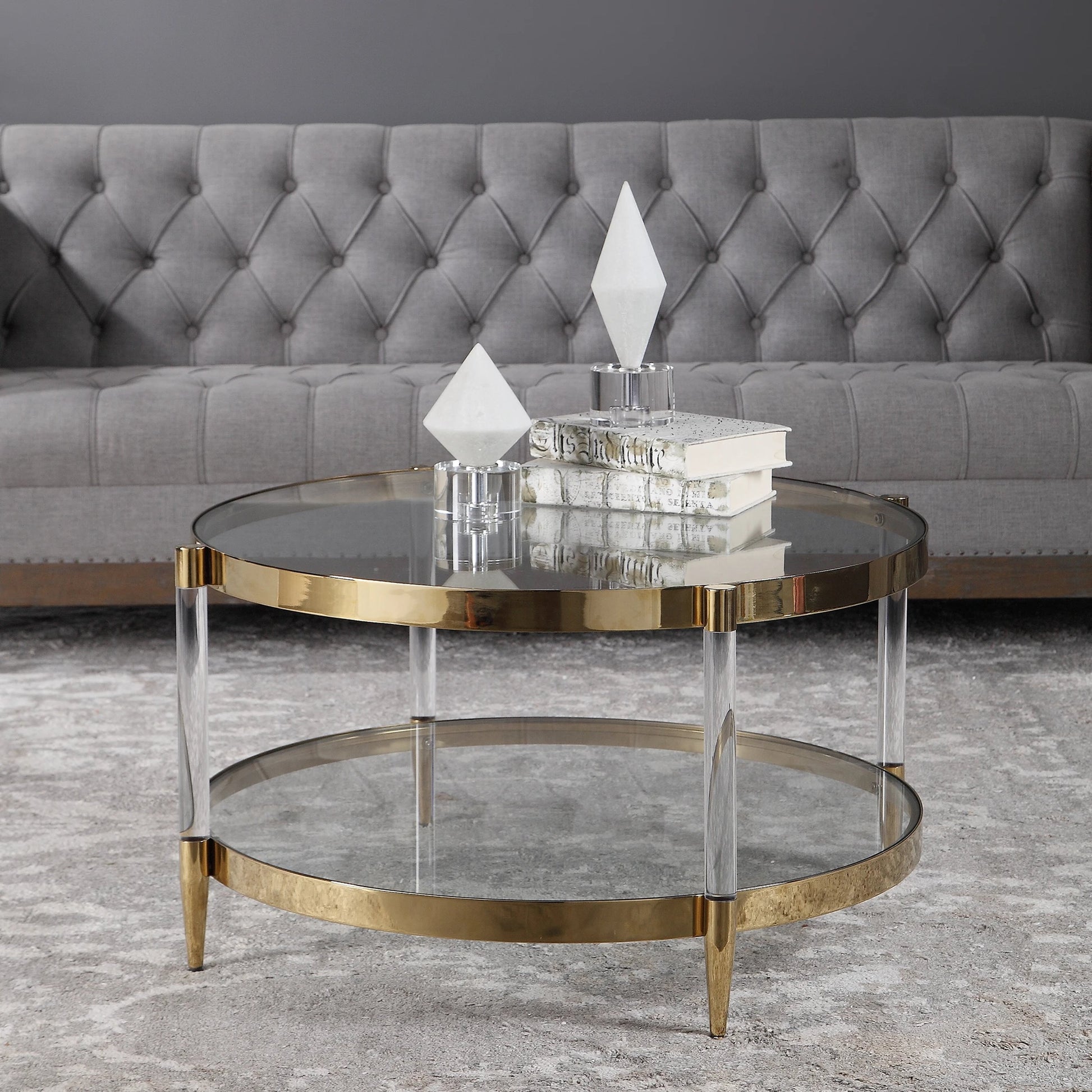 Kellen Coffee Table by Uttermost in gold. Made from stainless steel, glass, acrylic in a transitional style.