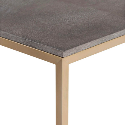 Trebon Modern Coffee Table by Uttermost. Made from stainless steel, faux shargreen with wrapped mdf in a modern style.