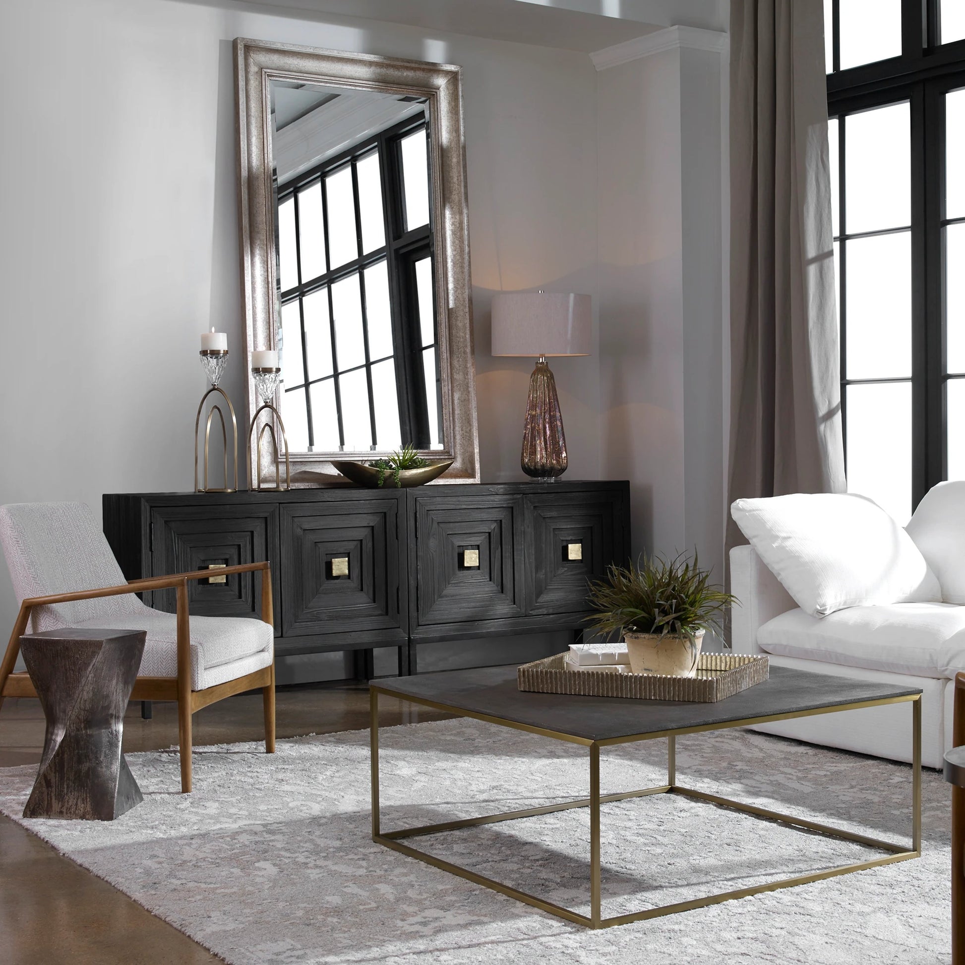 Trebon Modern Coffee Table by Uttermost. Made from stainless steel, faux shargreen with wrapped mdf in a modern style.