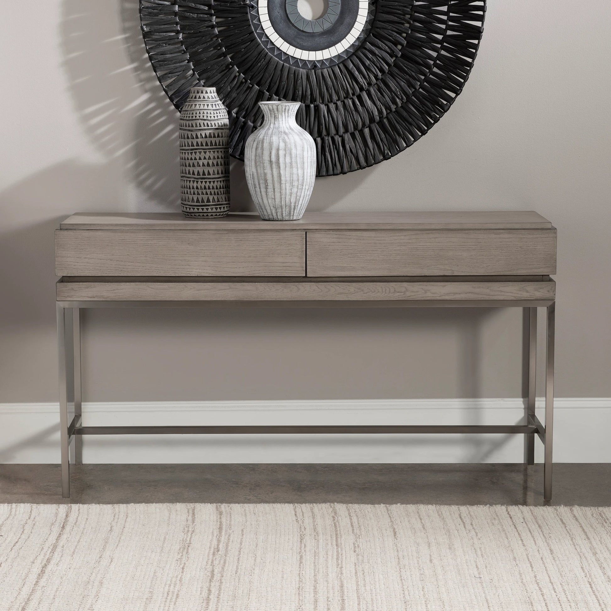 Kamala Console Table by Uttermost in gray. Made from stainless steel, mdf, oak veneer in a modern style.