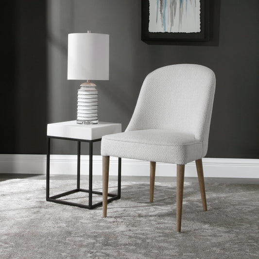 Brie Armless Chair (Set of 2) by Uttermost in white. Made from fabric, eucalyptus, foam, rubber wood in a transitional style.