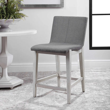 Brazos Counter Stool by Uttermost in gray. Made from rubber wood, plywood, fabric, foam in a modern style.