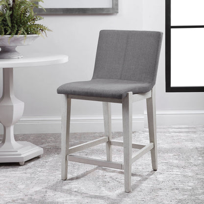 Brazos Counter Stool by Uttermost in gray. Made from rubber wood, plywood, fabric, foam in a modern style.