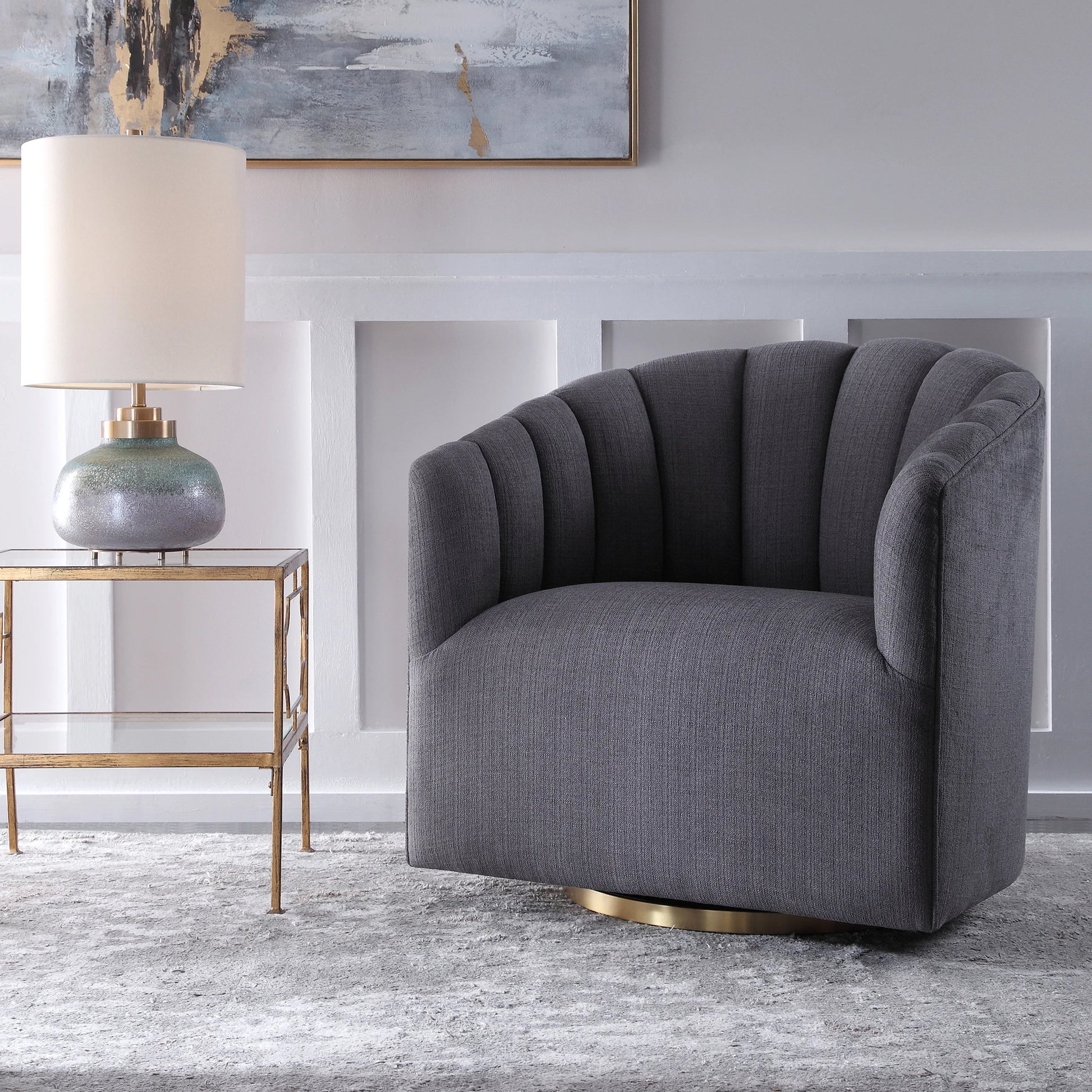 Cuthbert Modern Swivel Chair by Uttermost. Made from stainless steel, plywood, hardwood, foam, fabric in a transitional style.