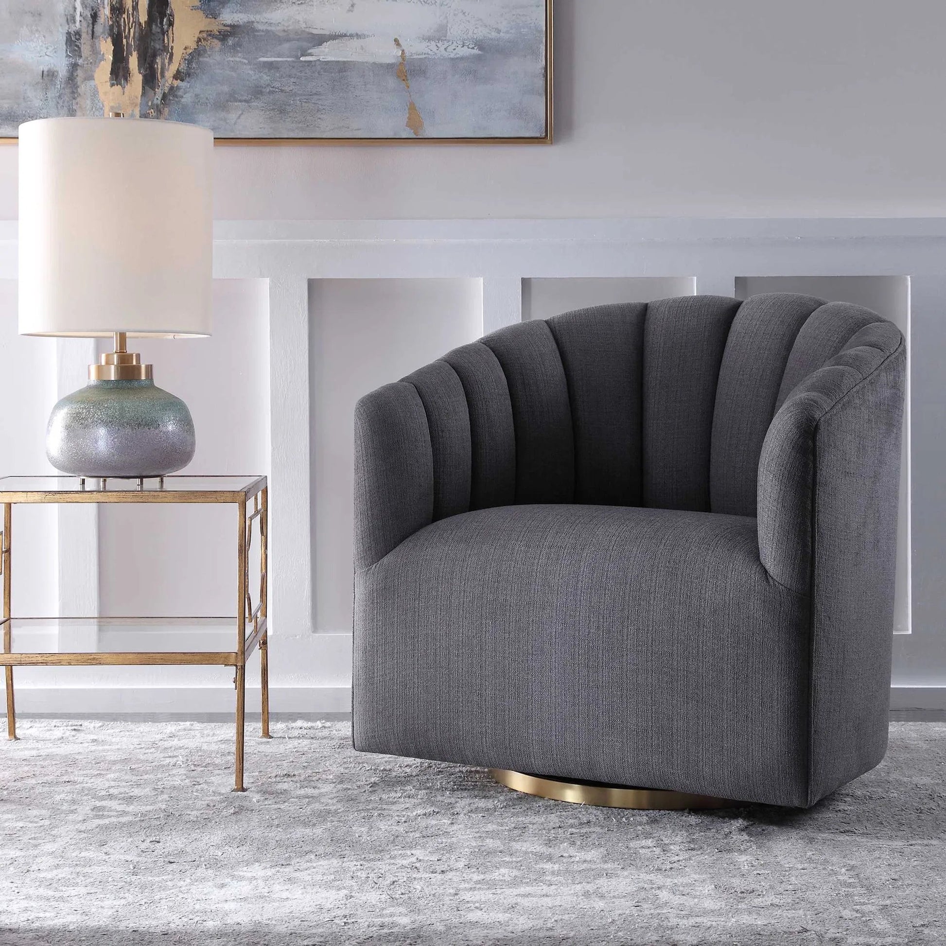 Cuthbert Modern Swivel Chair by Uttermost. Made from stainless steel, plywood, hardwood, foam, fabric in a transitional style.