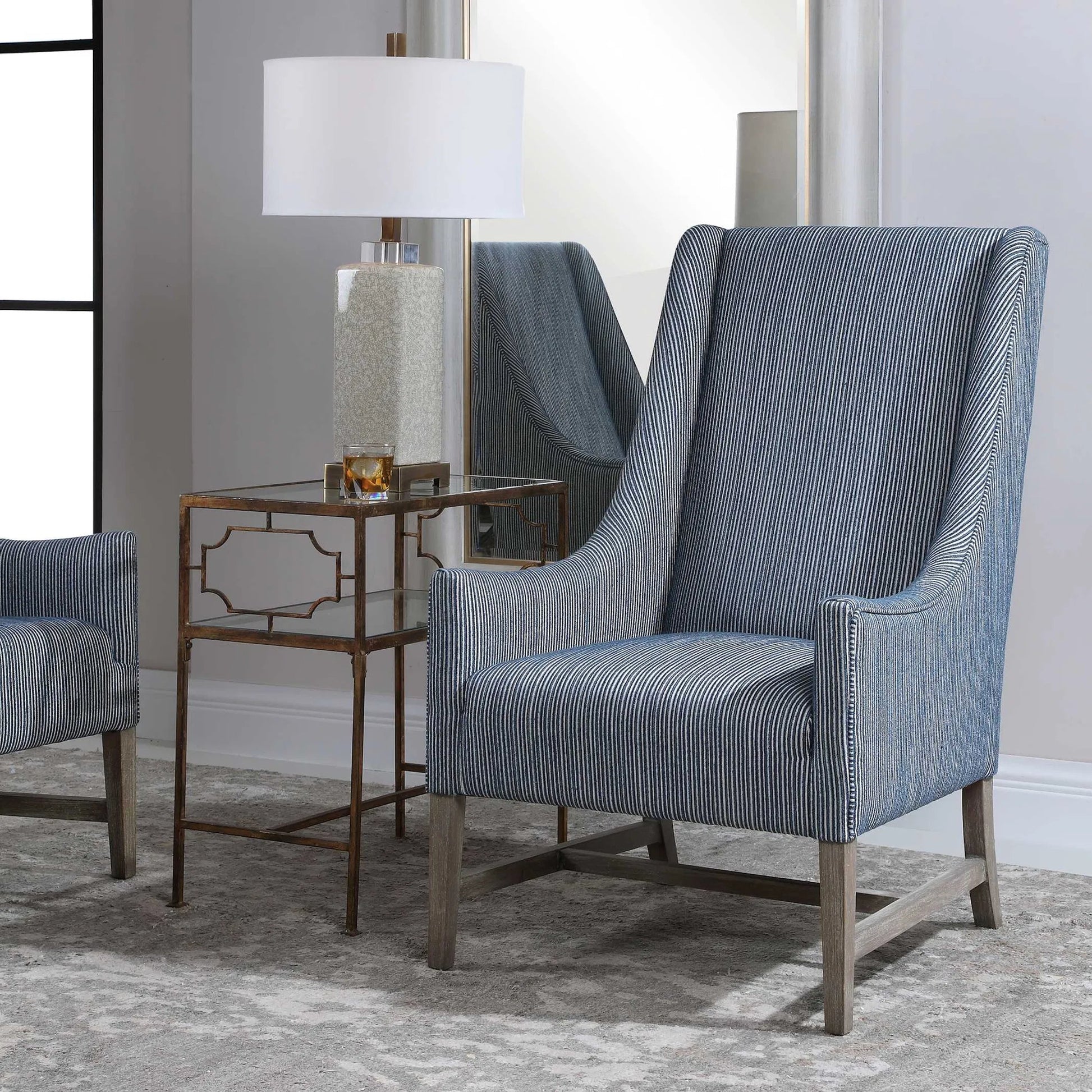 Galiot Wingback Accent Chair by Uttermost. Made from rubber wood, eucalyptus, fabric, foam, plywood in a modern style.