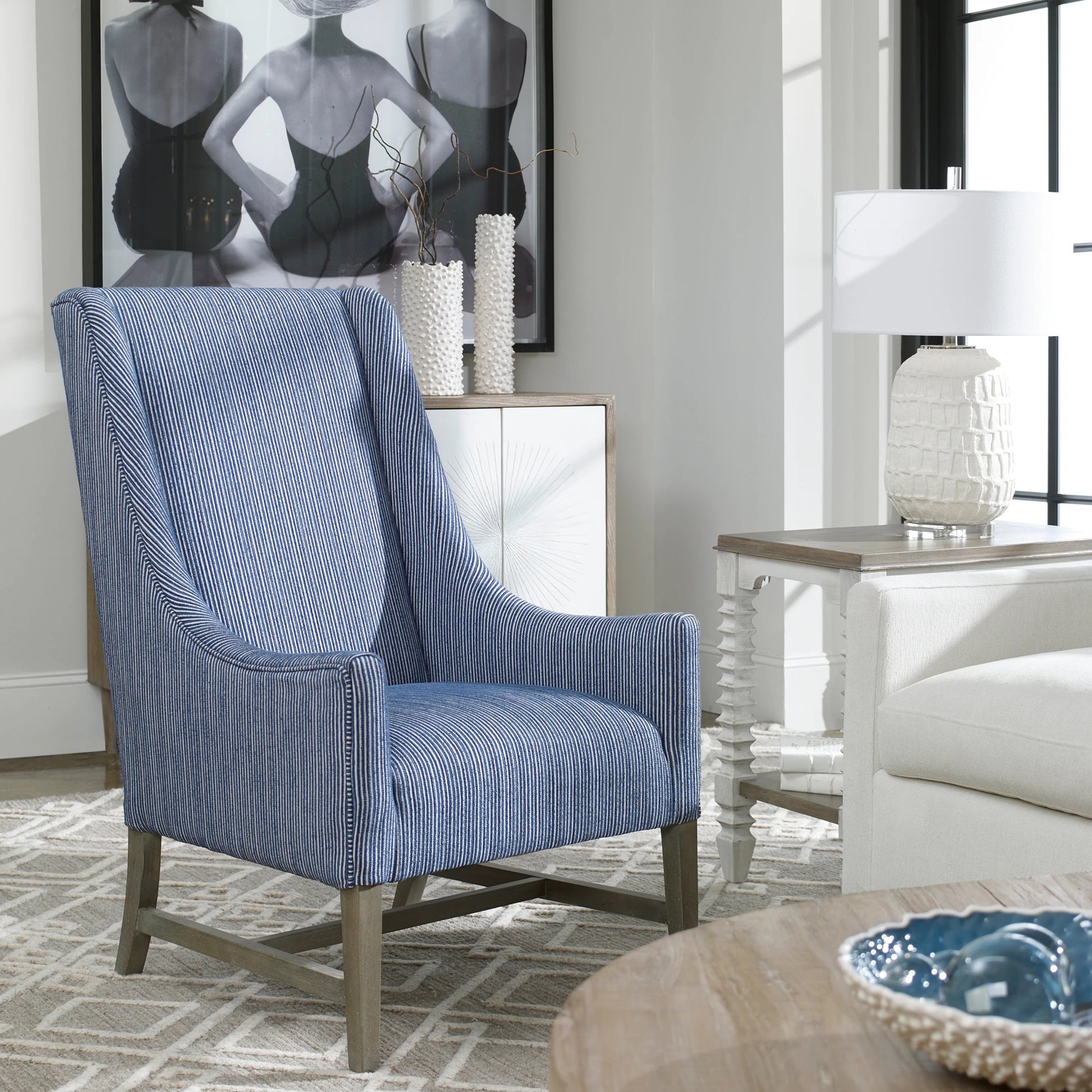 Galiot Wingback Accent Chair by Uttermost. Made from rubber wood, eucalyptus, fabric, foam, plywood in a modern style.