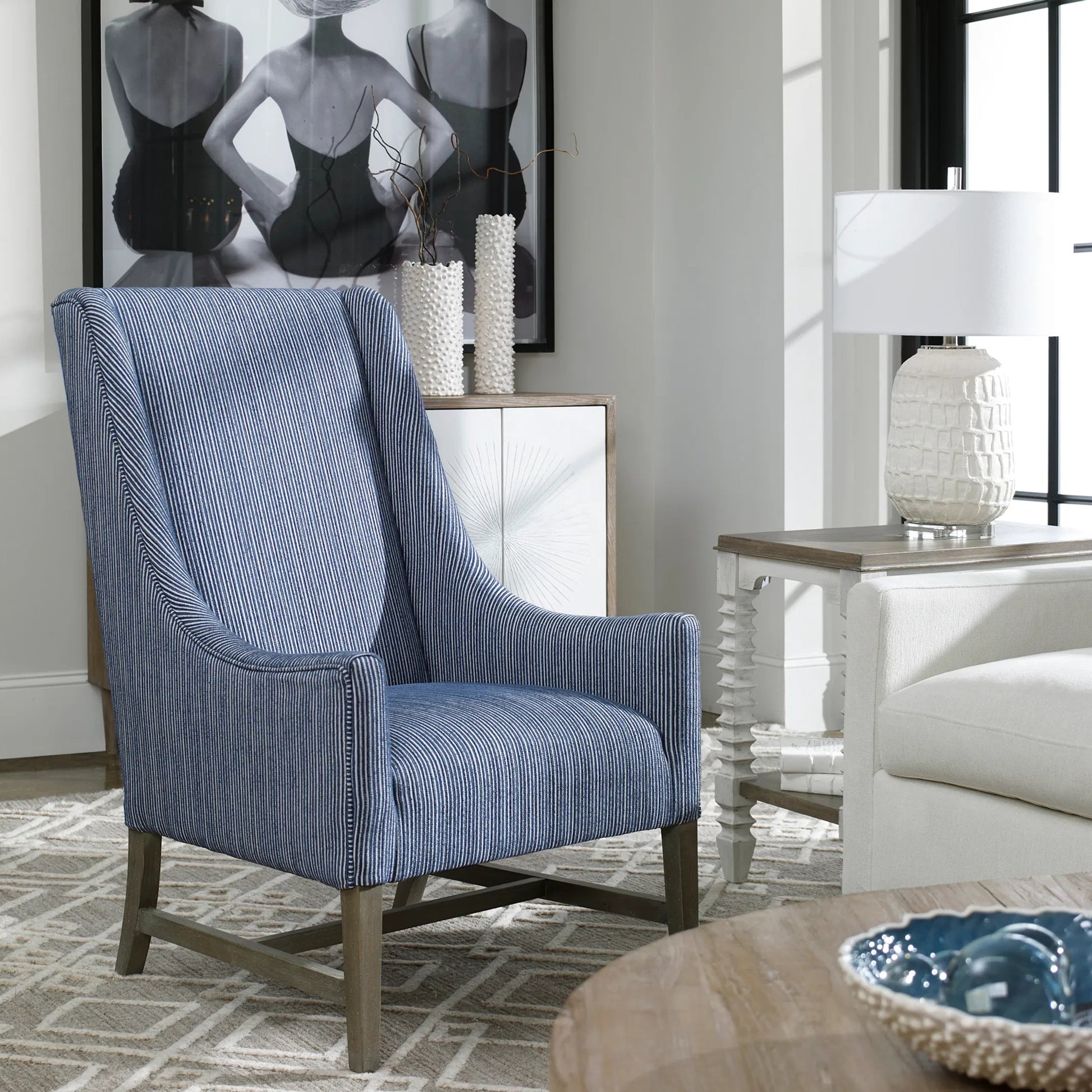Galiot Wingback Accent Chair by Uttermost. Made from rubber wood, eucalyptus, fabric, foam, plywood in a modern style.