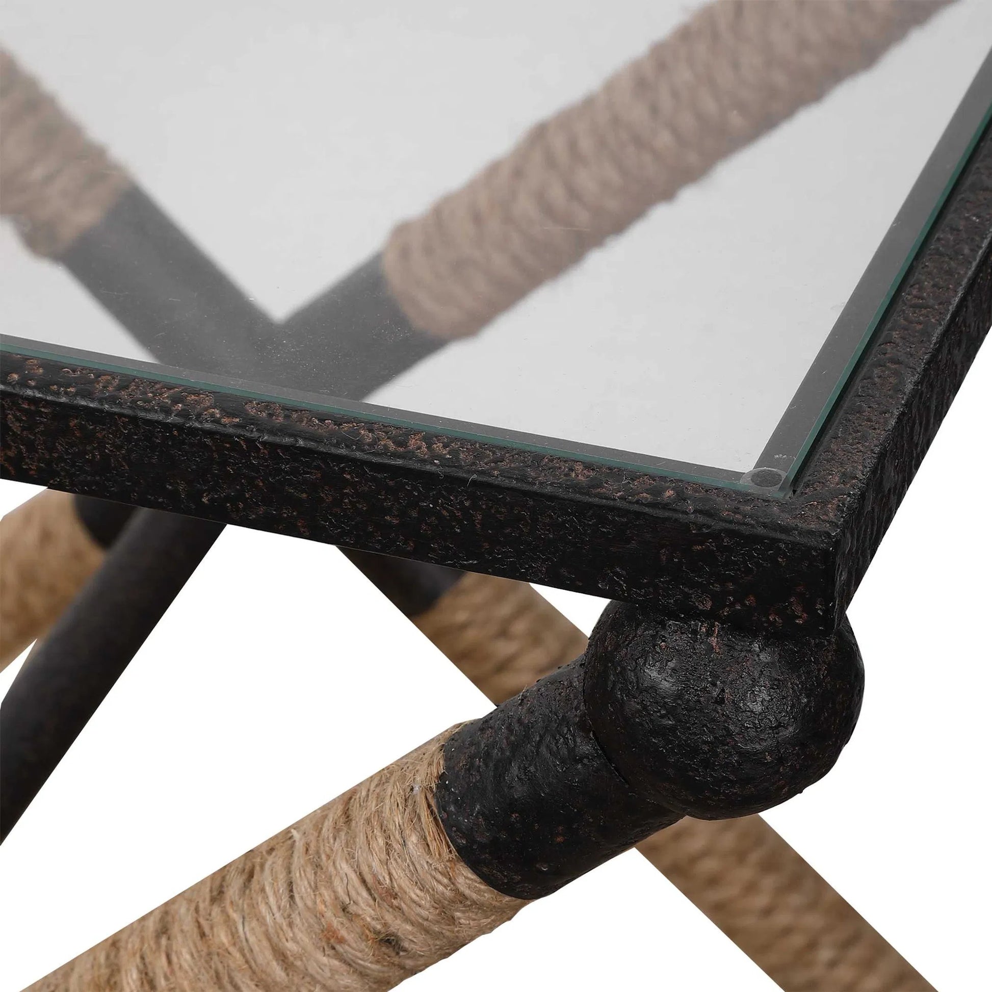 Braddock Accent Table by Uttermost. Made from iron, glass, rope in a coastal style.