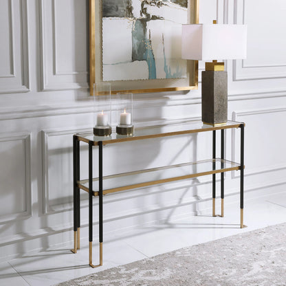 Kentmore Modern Console Table by Uttermost in matte black, brushed gold. Made from iron, glass in a transitional style.