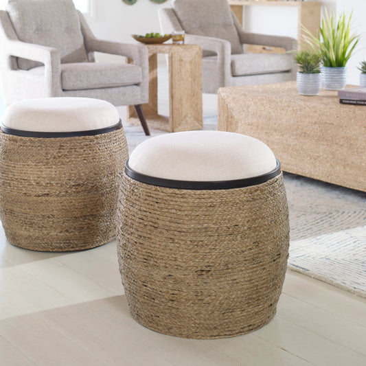 Island Straw Accent Stool by Uttermost. Made from mdf, straw, iron, foam, liene, dacron in a coastal style.