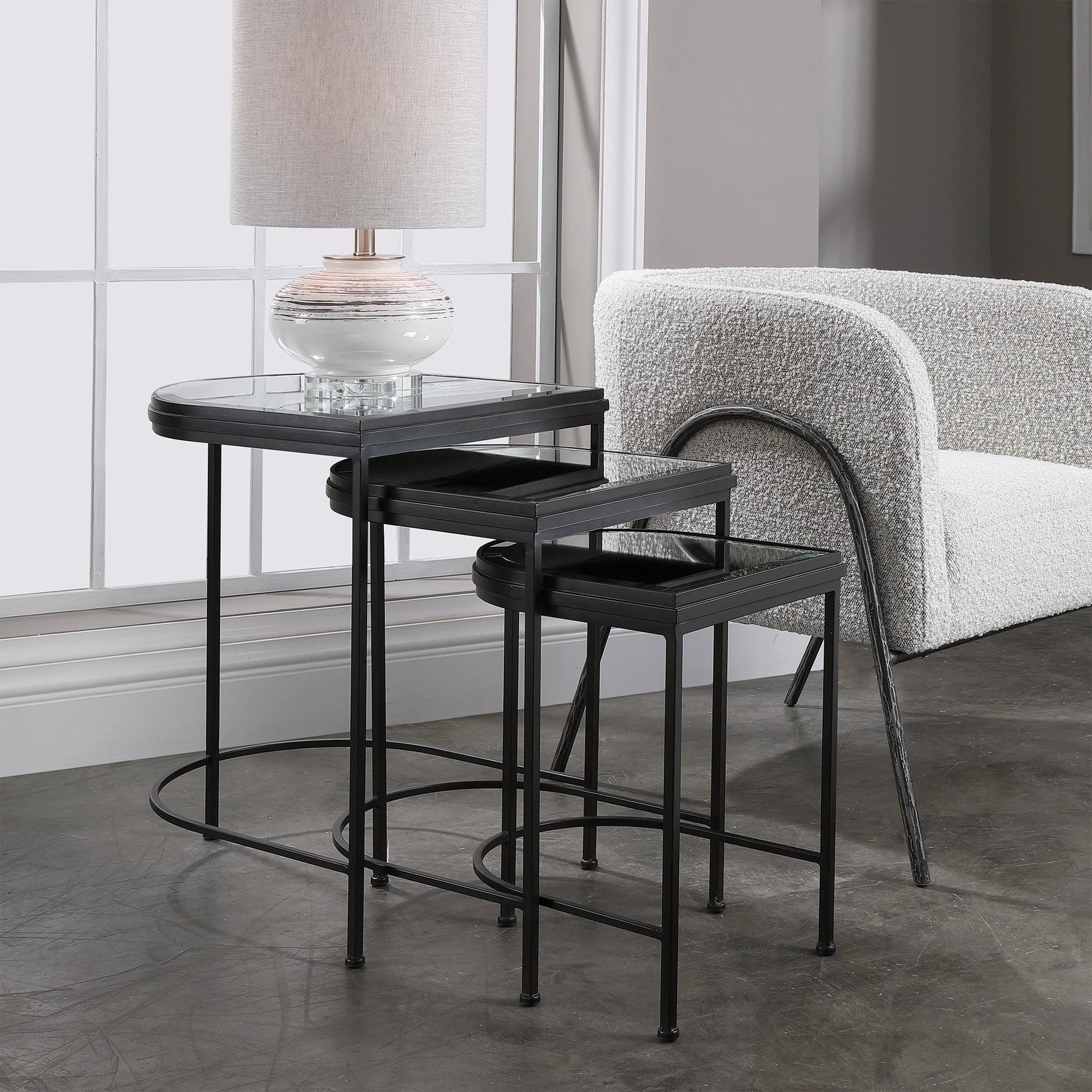 India Nesting Tables by Uttermost in antique brushed gold. Made from mirror 45%, iron 55% in a transitional style.