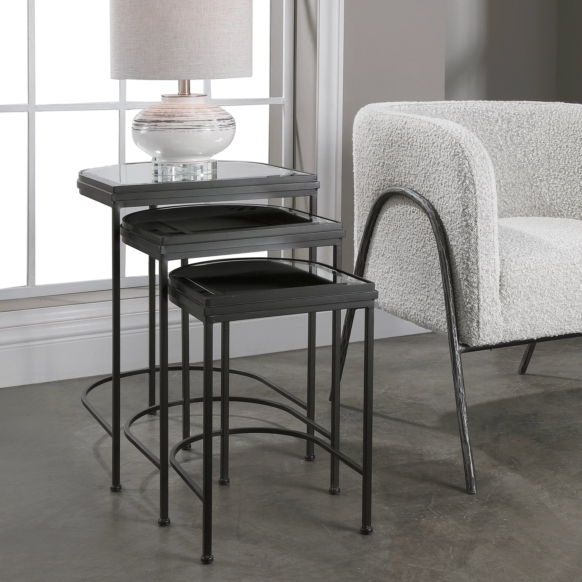 India Nesting Tables by Uttermost in antique brushed gold. Made from mirror 45%, iron 55% in a transitional style.
