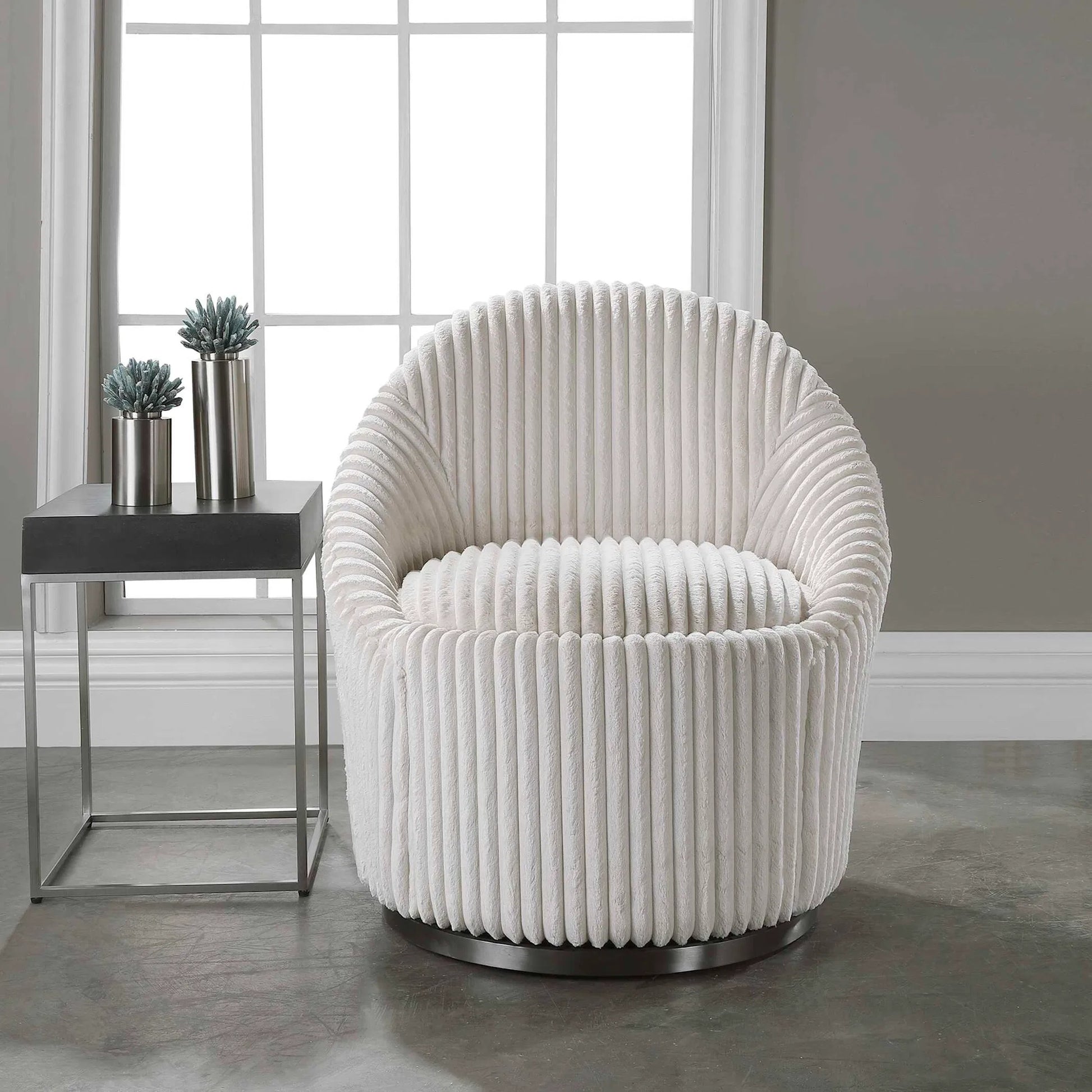 Crue Swivel Chair by Uttermost. Made from plywood, hardwood, fabric, foam, stainless steel in a modern style.