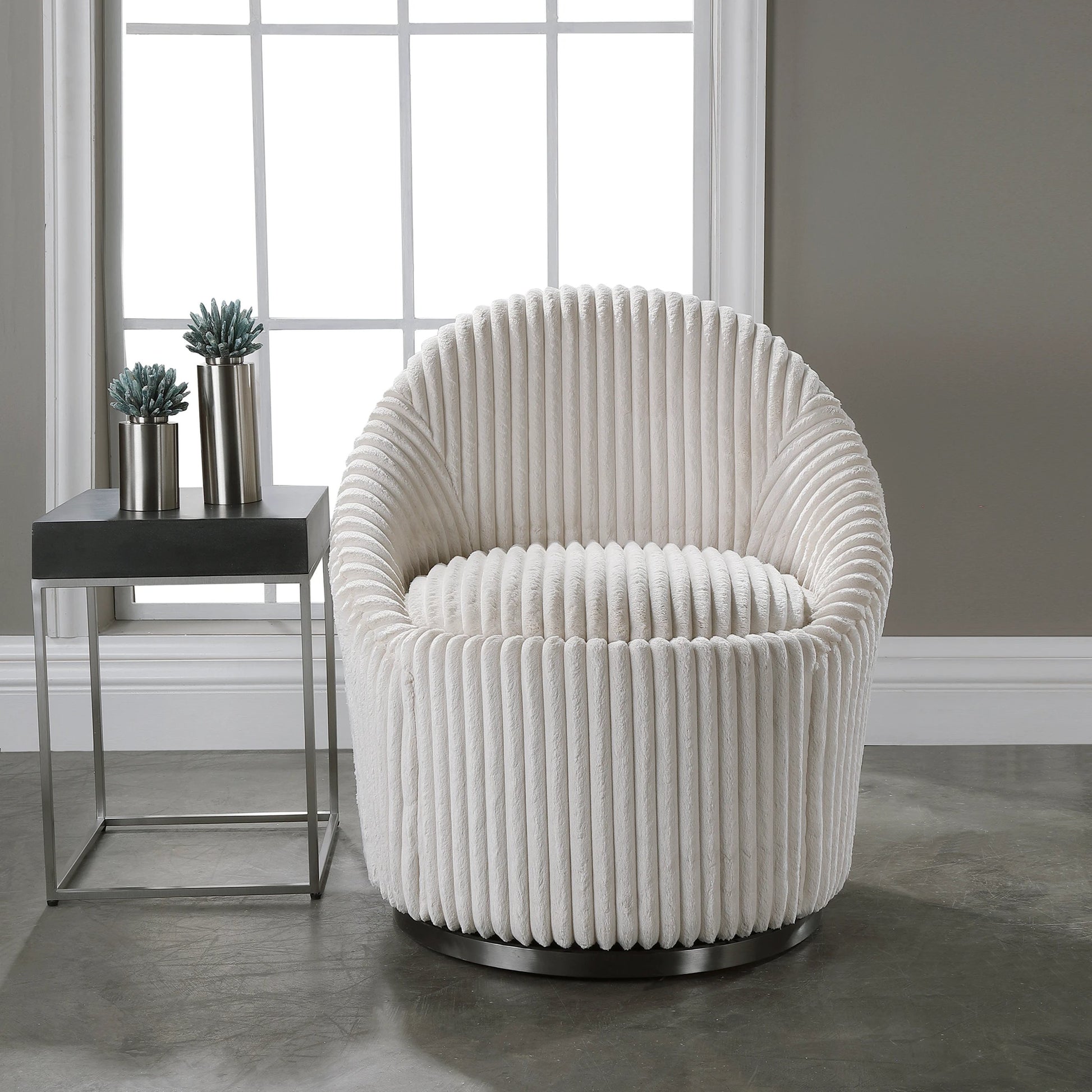 Crue Swivel Chair by Uttermost. Made from plywood, hardwood, fabric, foam, stainless steel in a modern style.