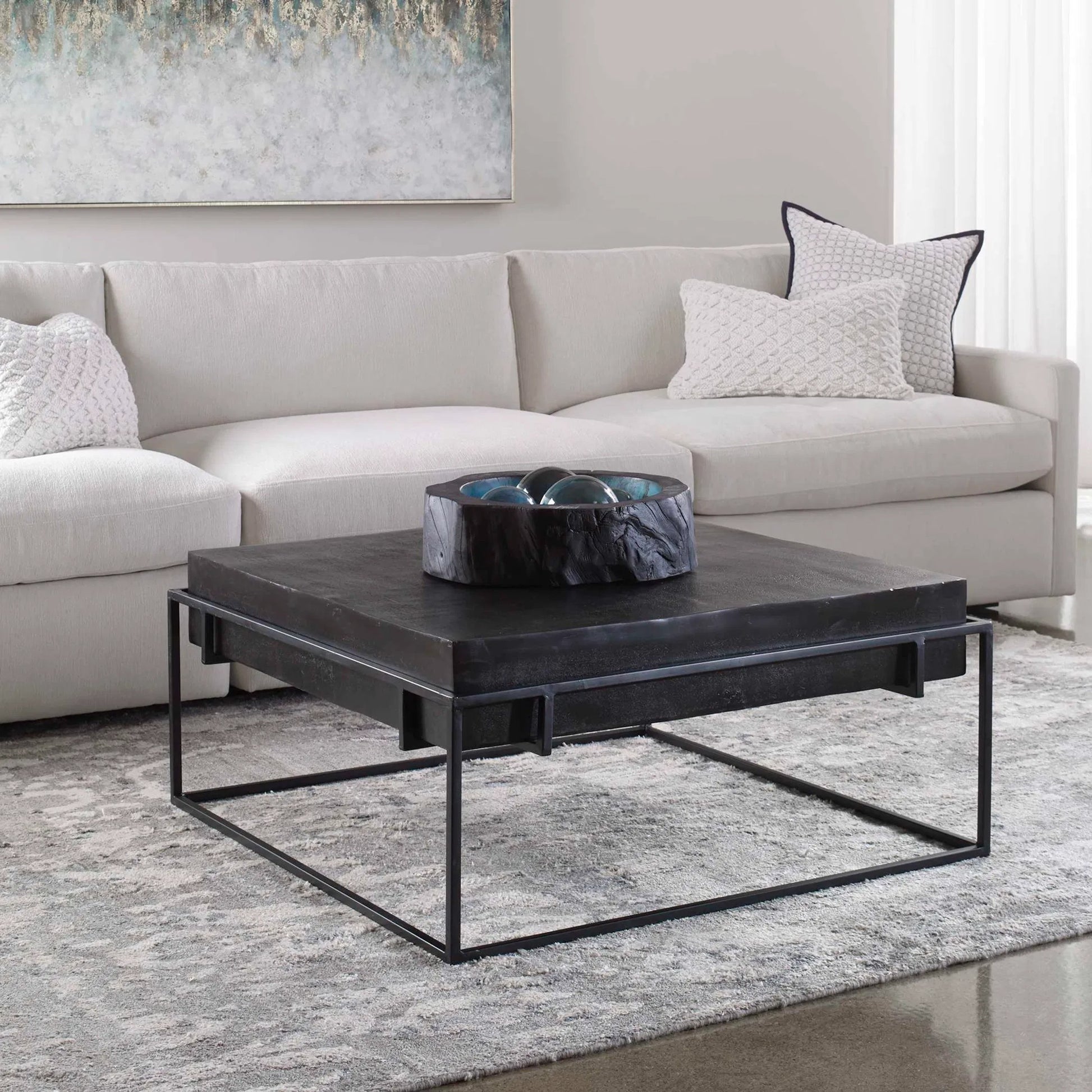 Telone Coffee Table by Uttermost in black. Made from iron, aluminum in a modern style.