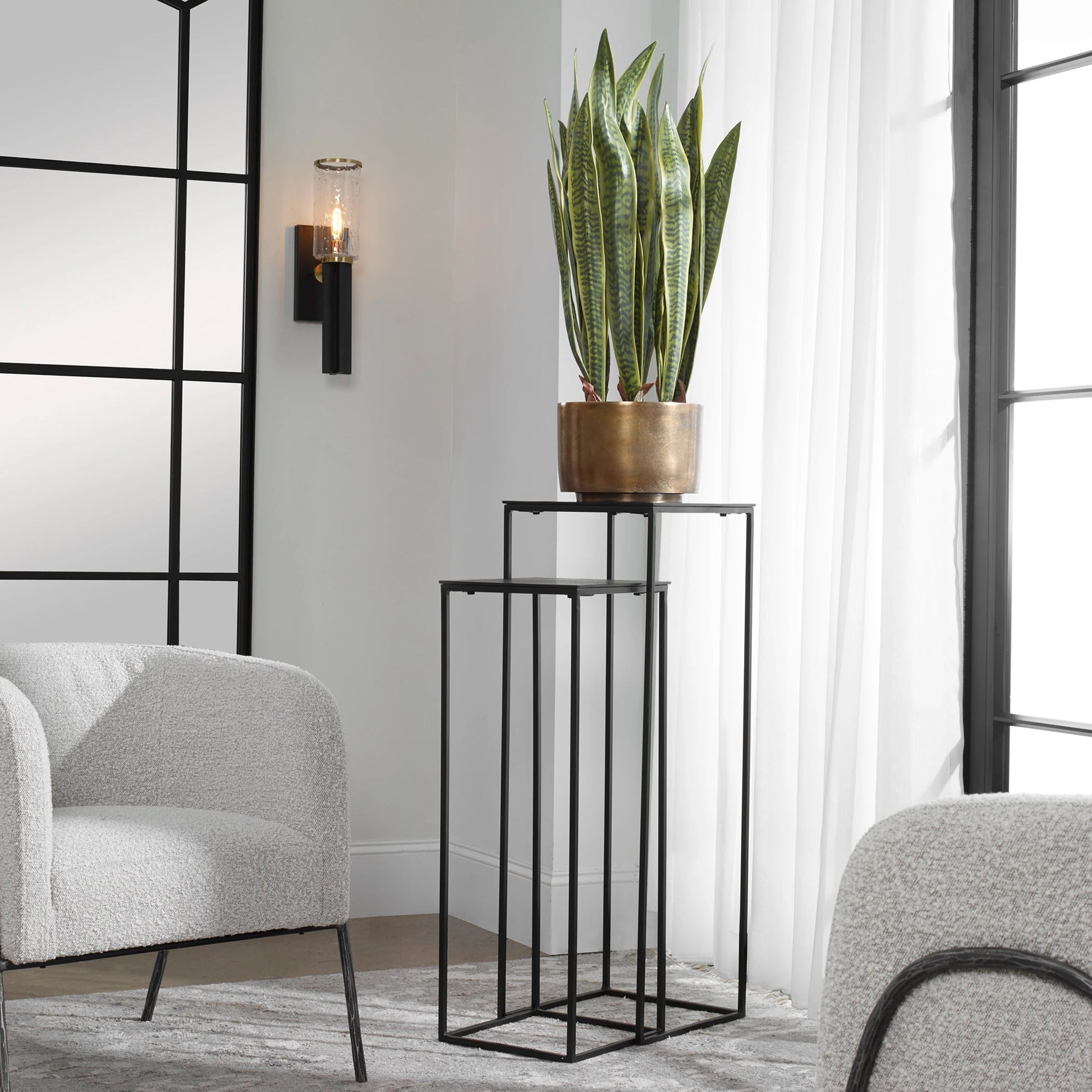Coreene Nesting Pedestals (Set of 2) by Uttermost in antique bronze. Made from iron, aluminum in a modern style.