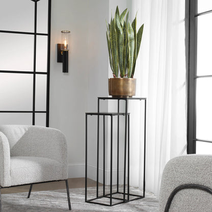 Coreene Nesting Pedestals (Set of 2) by Uttermost in antique bronze. Made from iron, aluminum in a modern style.