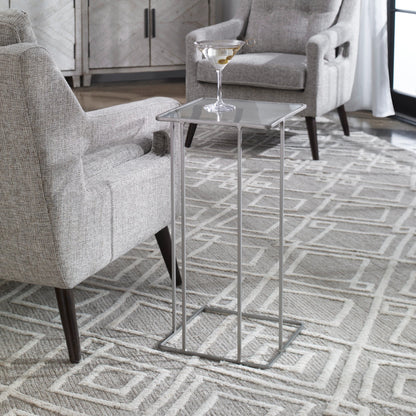 Cadmus Accent Table by Uttermost in black. Made from iron, glass in a modern style.