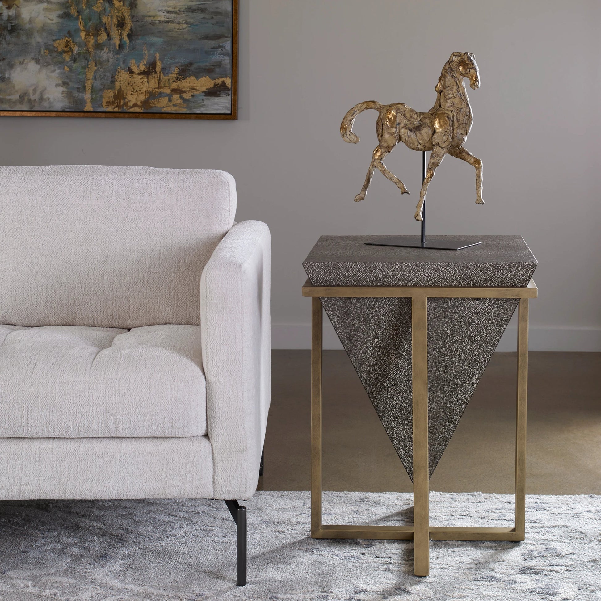Bertrand Accent Table by Uttermost in aged gold. Made from iron, mdf, faux leather in a eclectic & global style.