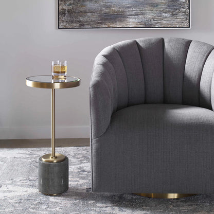 Laurier Accent Table by Uttermost in brass. Made from 50% iron, 15% glass, 10% faux ful, 25% pine wood in a transitional style.