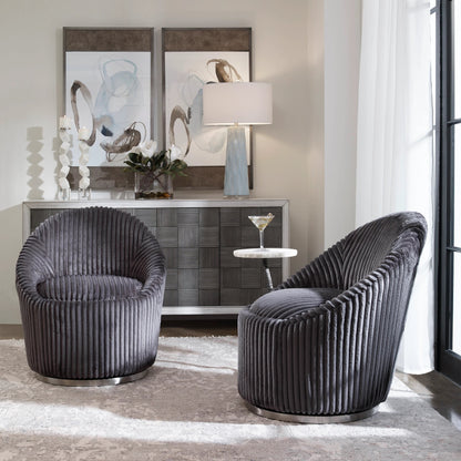 Crue Swivel Chair by Uttermost. Made from plywood, hardwood, fabric, foam, stainless steel in a modern style.