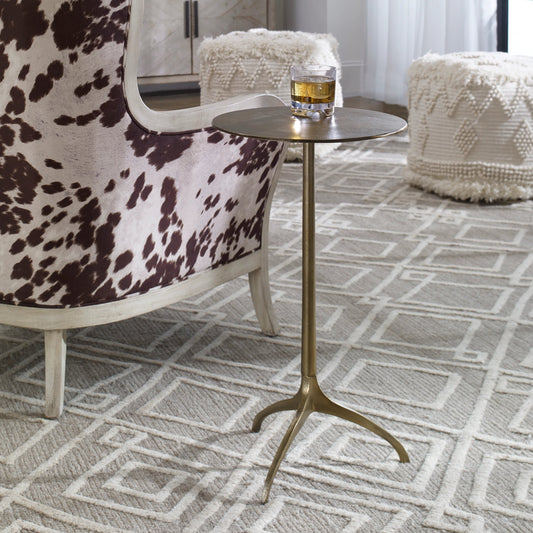 Beacon Accent Table by Uttermost in antique gold. Made from aluminum in a eclectic & global style.