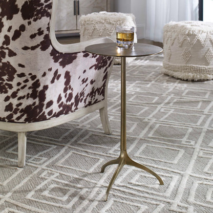 Beacon Accent Table by Uttermost in antique gold. Made from aluminum in a eclectic & global style.