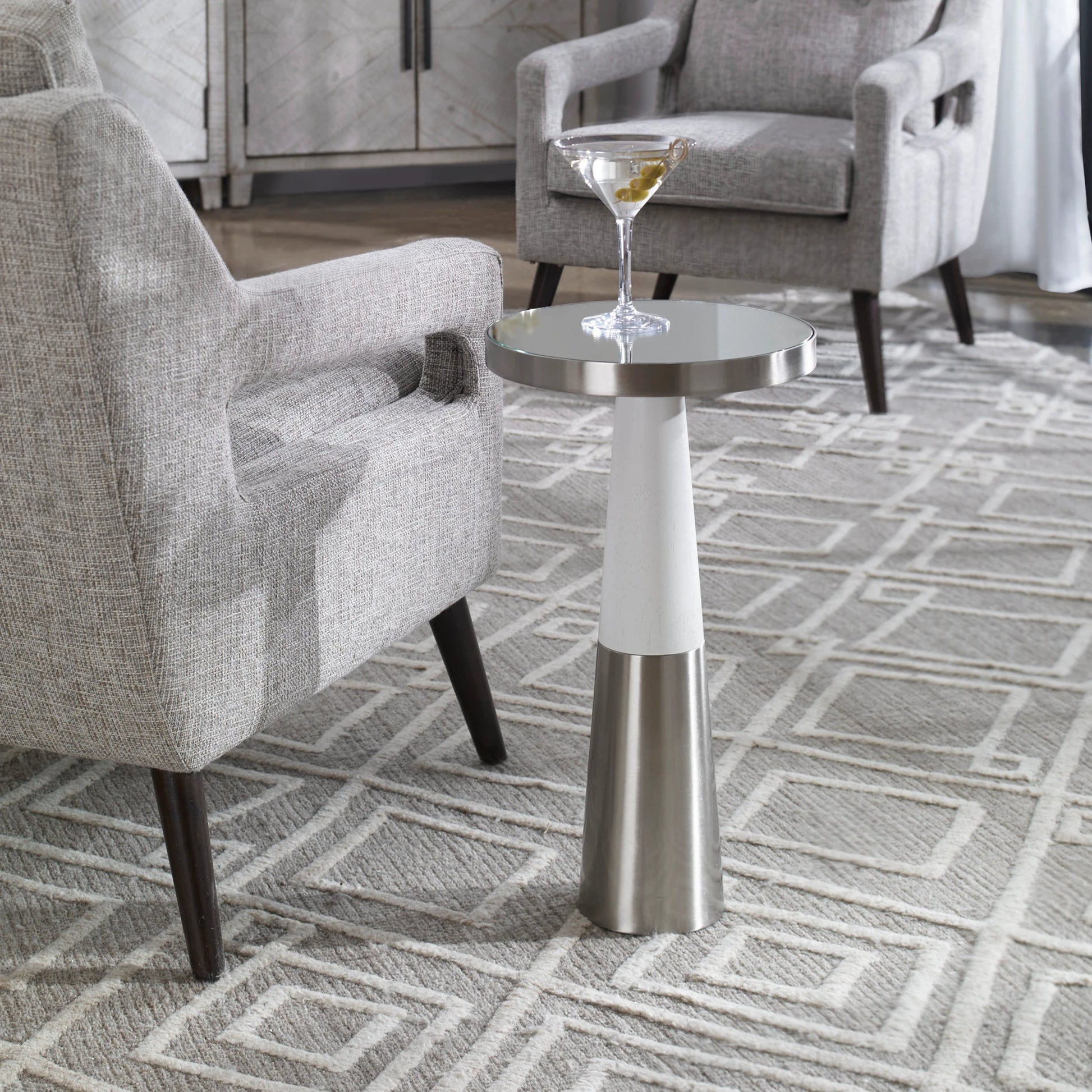 Fortier Accent Table by Uttermost in black. Made from 50% iron, 10% glass, 40% rubber wood in a eclectic & global style.