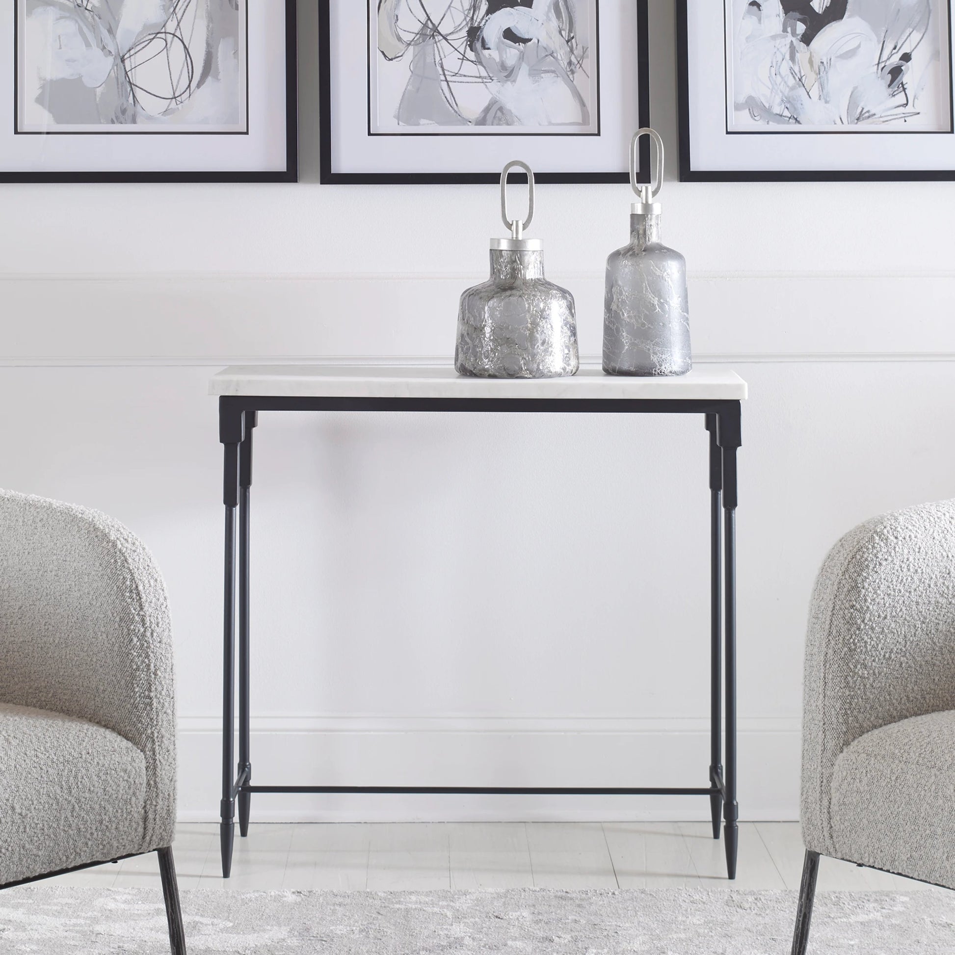Bourges Console Table by Uttermost in white, satin black. Made from marble, iron in a transitional style.