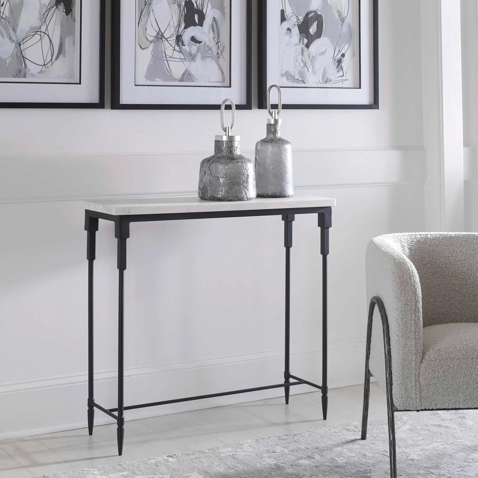 Bourges Console Table by Uttermost in white, satin black. Made from marble, iron in a transitional style.