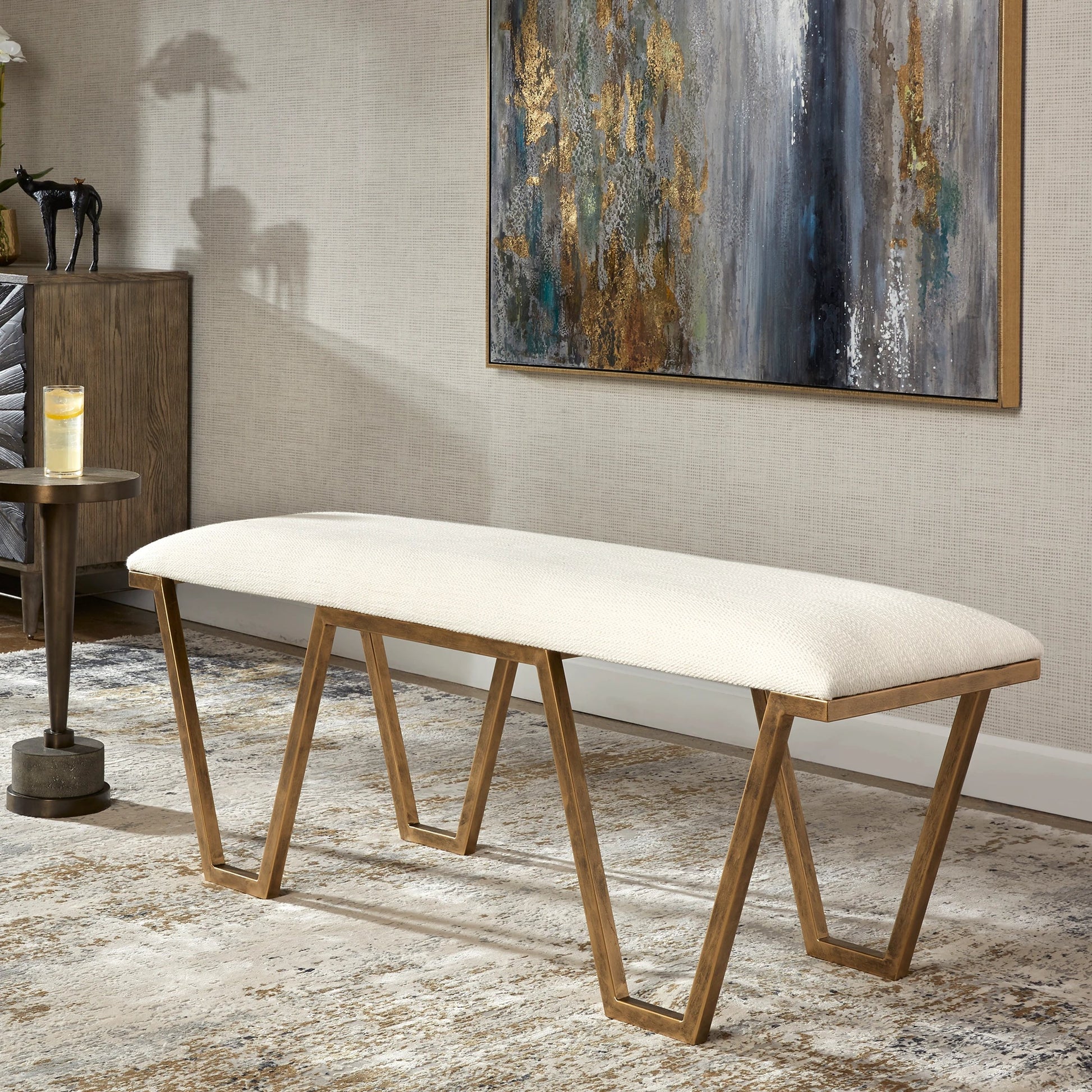 Farrah Bench by Uttermost in antique gold leaf. Made from iron, mdf, polyester, foam in a modern style.