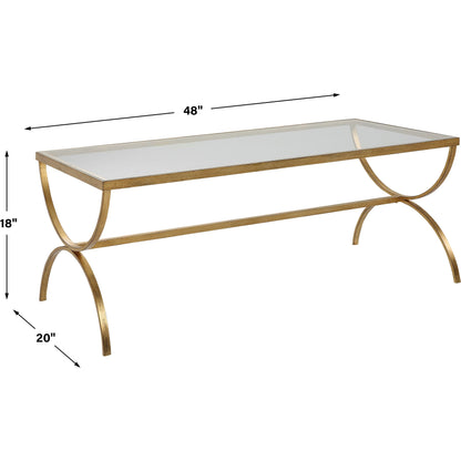 Crescent Coffee Table by Uttermost in gold. Made from iron, tempered glass in a modern style.