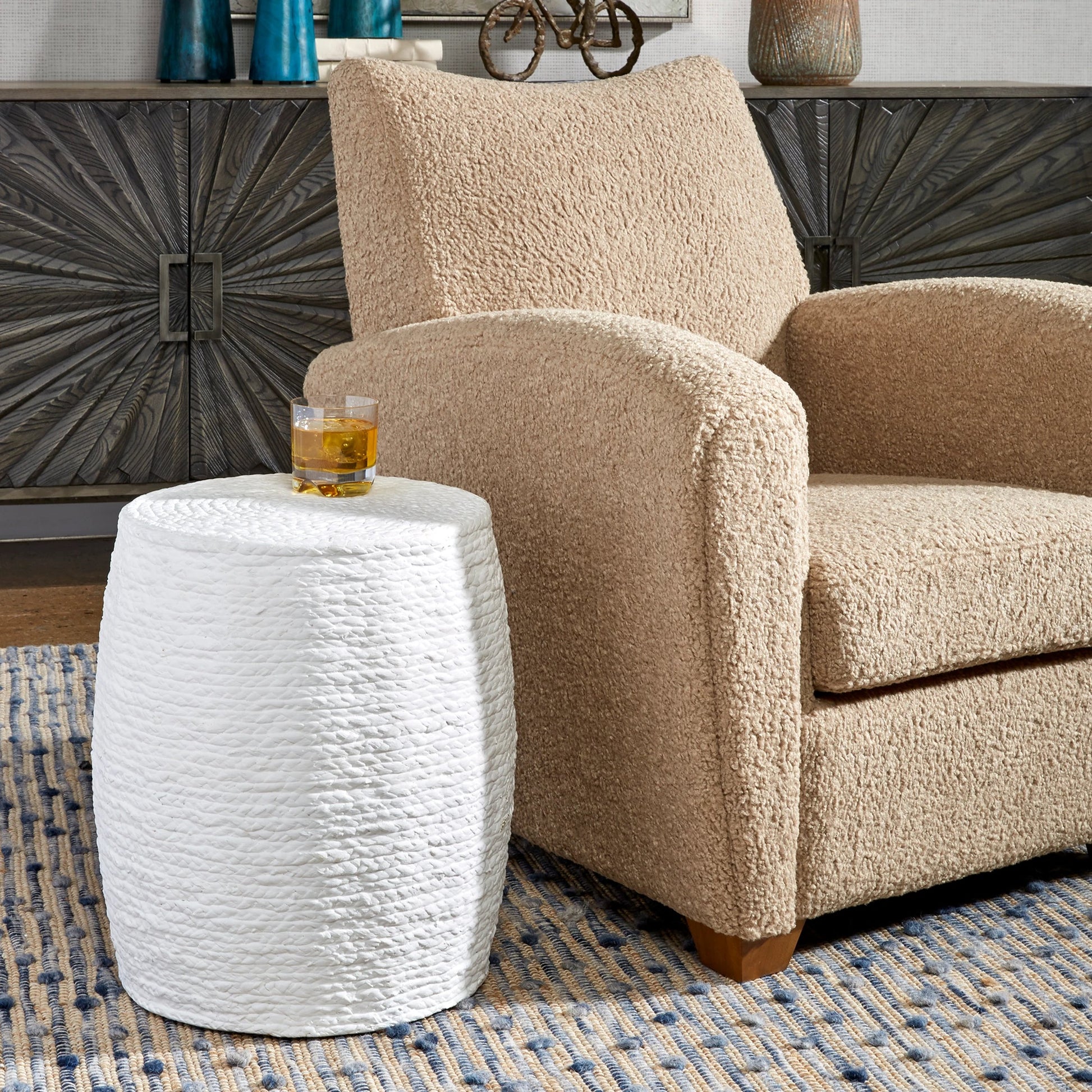 Resort Accent Stool by Uttermost. Made from mdf, straw rope, fir in a coastal style.