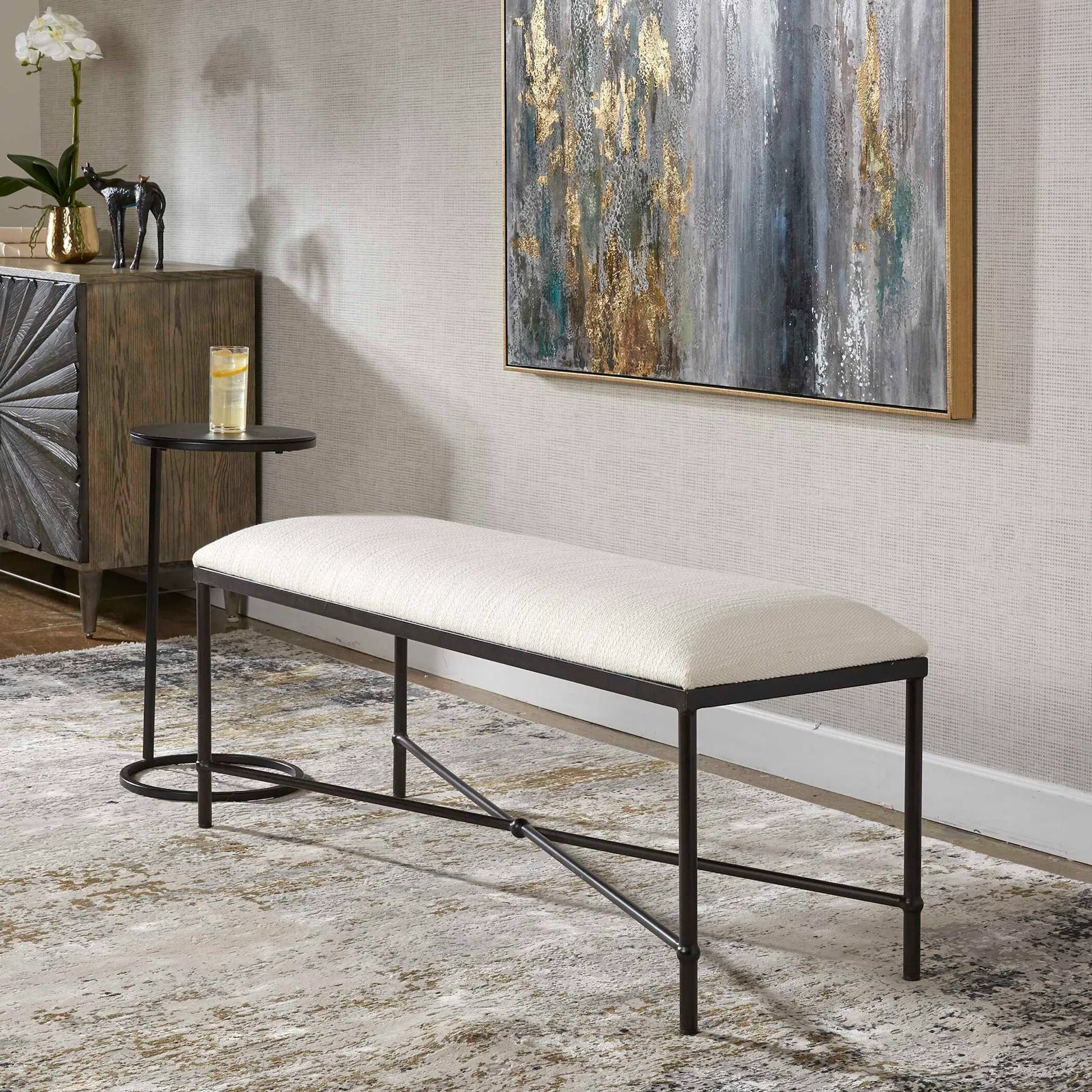 Avenham Bench by Uttermost in satin black. Made from foam, fabric, mdf, iron in a coastal style.
