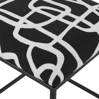 Twists and Turns Accent Stool by Uttermost in matte black. Made from iron, mdf, foam, polyester in a modern style.