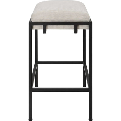 Paradox Counter Stool by Uttermost in matte black. Made from iron, mdf, foam, polyester in a modern style.