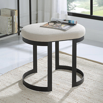 Infinity Accent Stool by Uttermost in gold. Made from metal, mdf, foam, fabric in a modern style.