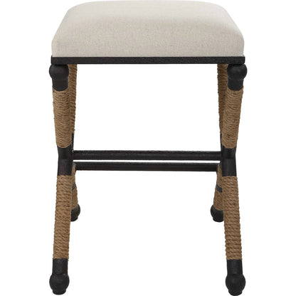 Firth Rustic Oatmeal Counter Stool by Uttermost in black, natural. Made from mdf, farbic, iron, foam, rope in a coastal style.