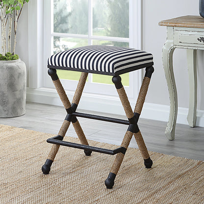 Braddock Counter Stool by Uttermost in navy, cream and iron. Made from mdf, farbic, iron, foam, rope in a coastal style.
