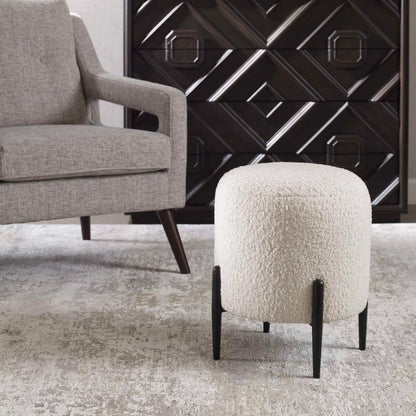 Arles Ottoman by Uttermost in white and satin black. Made from hardwood, plywood, fabric, foam in a transitional style.
