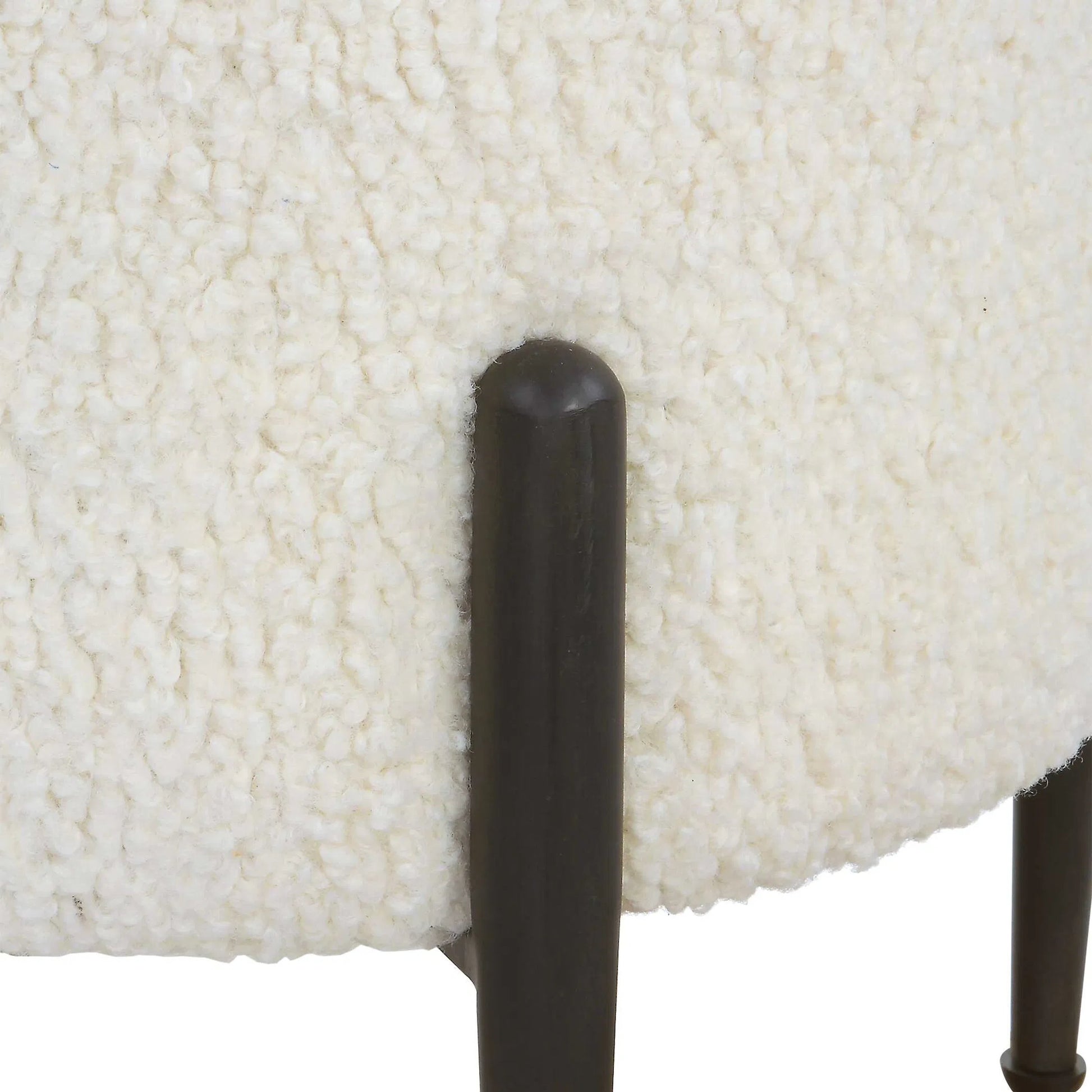 Arles Ottoman by Uttermost in white and satin black. Made from hardwood, plywood, fabric, foam in a transitional style.
