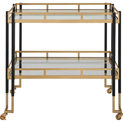 Kentmore Bar Cart by Uttermost in matte black, brushed gold. Made from iron, tempered glass in a modern style.