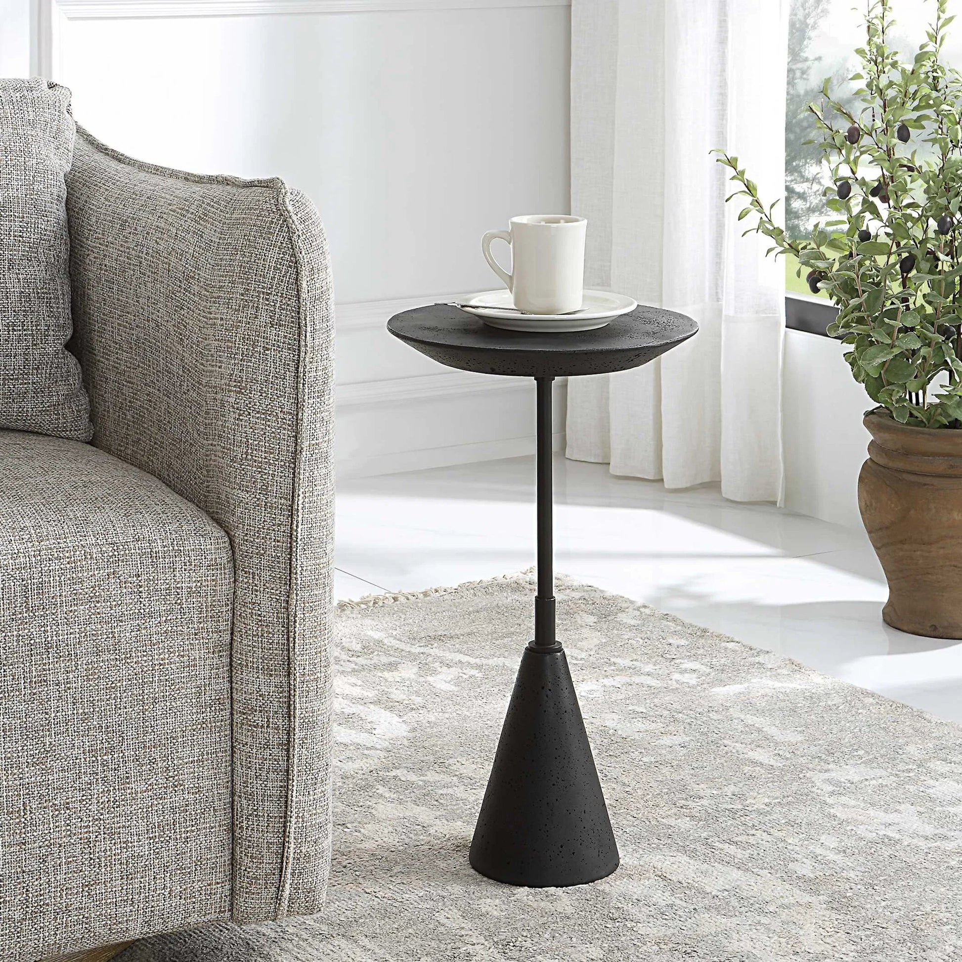 Midnight Accent Table by Uttermost in black. Made from black marble polymer, steel in a modern style.