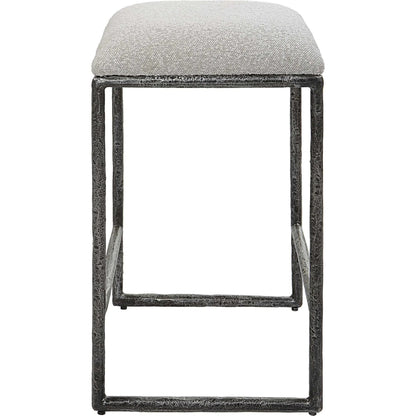 Brisbane Counter Stool by Uttermost in ivory, gray and charcoal. Made from cast iron, mdf, foam, fabric in a modern style.